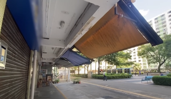 房署：梨木樹二邨帆布簷蓬屬潛建須清拆  商戶：用咗40年