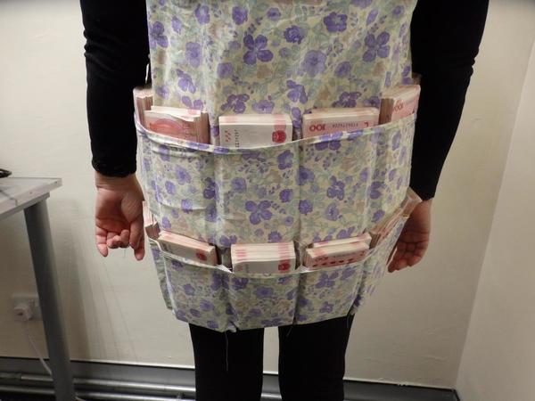 女子穿特製背心偷運萬人民幣/外幣 落馬洲口岸入境遭海關拘捕【3類物品過關必須申報】