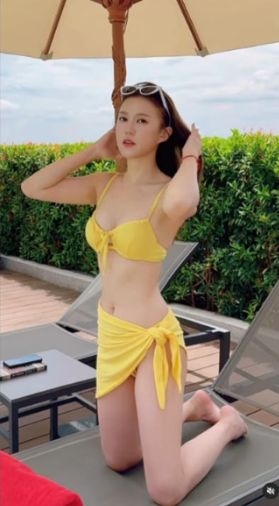 36歲TVB離巢女星譚嘉儀暢遊夏威夷 晒桃紅色泳衣美照 火辣身材震驚網民：好Sharp好正 