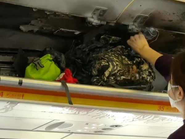 香港航空客機行李架起火畫面