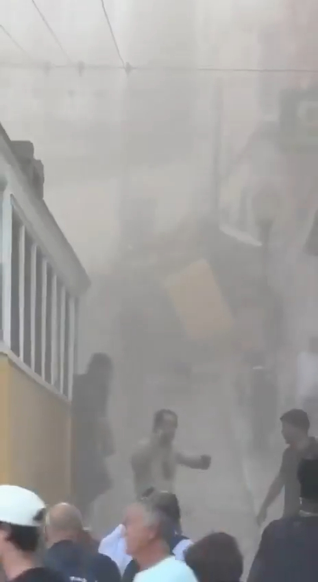 葡萄牙百年纜車出軌直撞大樓 葡萄牙百年纜車出軌直撞大樓