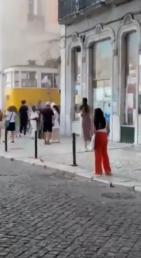 葡萄牙百年纜車出軌直撞大樓 葡萄牙百年纜車出軌直撞大樓