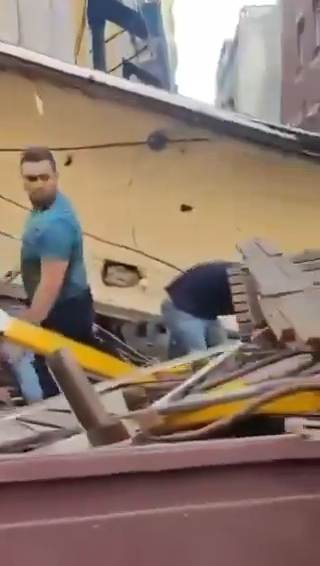 葡萄牙百年纜車出軌直撞大樓 葡萄牙百年纜車出軌直撞大樓