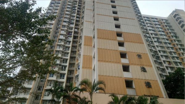 公屋最後一派中六合彩，一家四口獲派市區低樓齡樓。圖片來源：HKET圖庫