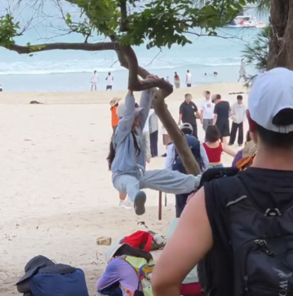 遊客來港「抱樹打卡」熱褲女闖西貢浪茄攀爬惹怒網民 觸犯1法例恐罰2.5萬兼坐監