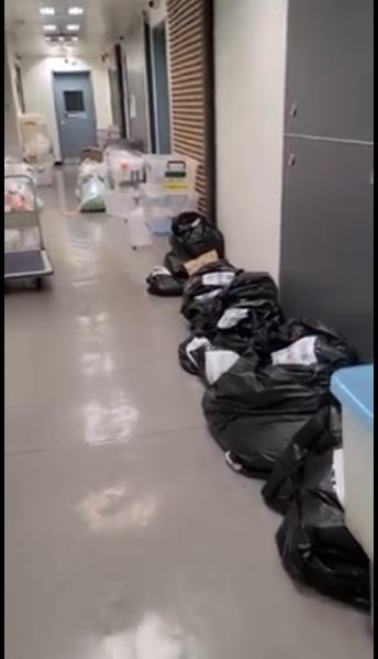 【本港疫情】網傳政府化驗部門影片指已達極限  走廊堆滿樣本瓶