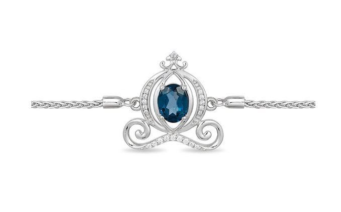 Enchanted Disney Cinderella Oval Blue Topaz and 1/10 CT. T.W. Diamond Carriage Bolo Bracelet in Sterling Silver - 9.5"