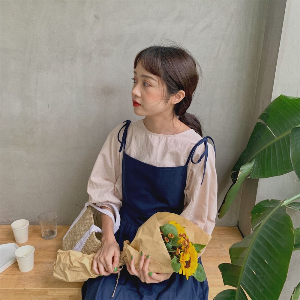 減齡綁帶純色中長款娃娃裙¥69.9 