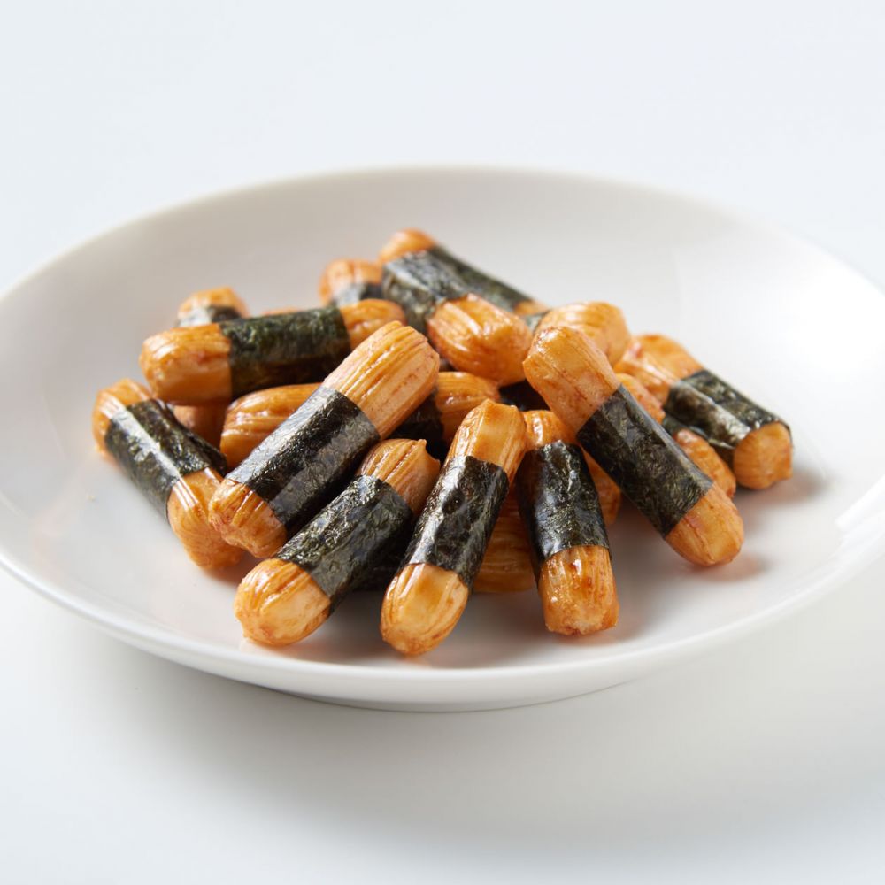 【海苔米餅小卷 售價：HK$10 | 容量：38g】 以甘香醬油帶出海苔的鮮味，香脆味美。