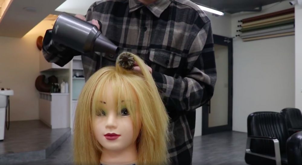 然後用風筒的熱力把弧度固定