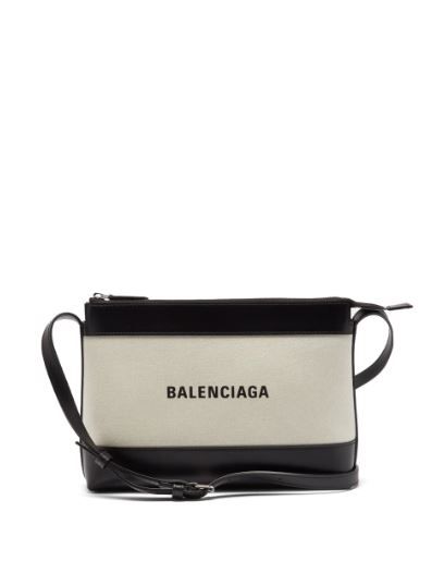 BALENCIAGA logo-print leather and canvas cross-body bag 網購價HK$6,580 | 香港官網售價HK$6,580 額外85折後：HK$5593 