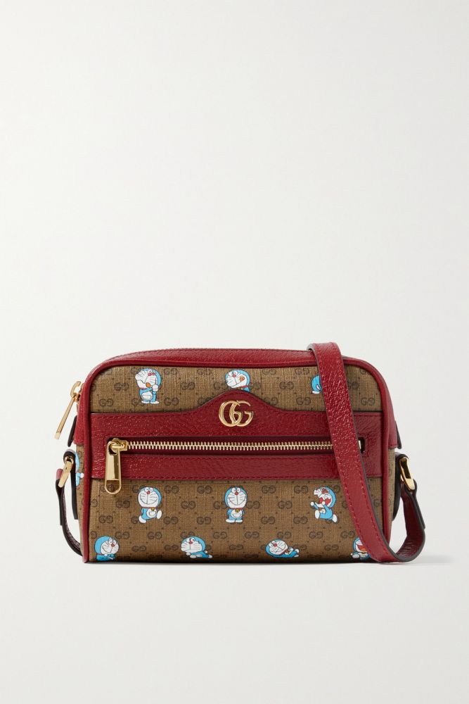 GUCCI+ Doraemon small textured leather-trimmed printed coated-canvas shoulder bag 網購價£770 | 退稅後：£642；折合港幣約 $ 6,878