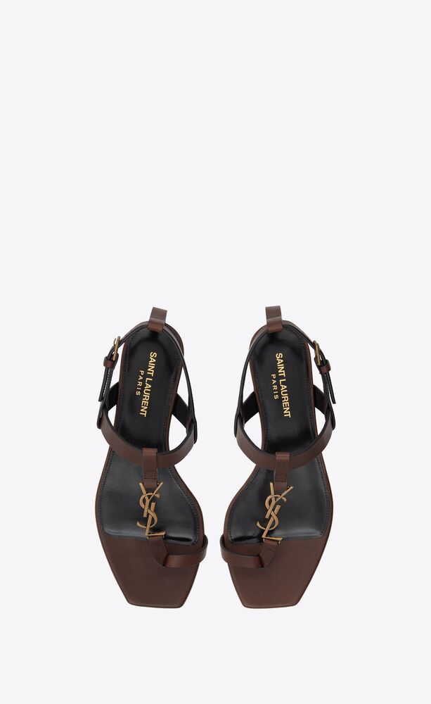 SAINT LAURENT CASSANDRA FLAT SANDALS IN SMOOTH LEATHER WITH GOLD-TONE MONOGRAM HK$ 6,450