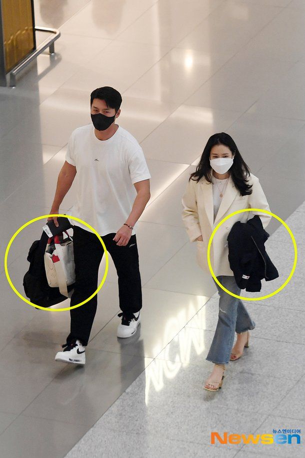 有粉絲拍攝到夫婦二人低調放閃，玄彬為老婆拿手袋，而孫藝珍則為老公拿外套。（圖片來源：Twitter）