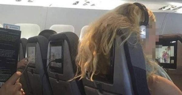 搭飛機遇前座乘客撥長髮遮螢幕 網民轟行為無品：想要把剪刀