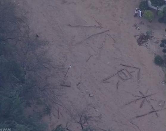 颱風海貝思暴雨釀水災 居民泥地上樹枝砌大字求水、食物
