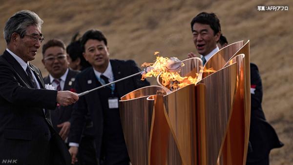 東京奧運聖火今日抵日本 強風吹熄聖火、五環飛行表演失敗