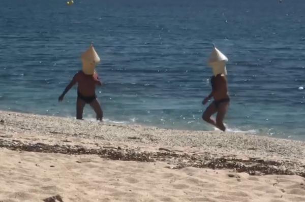法國兩名男子無視封城衝海灘游泳 奇裝打扮欲掩人耳目終變鬧劇當場被捕