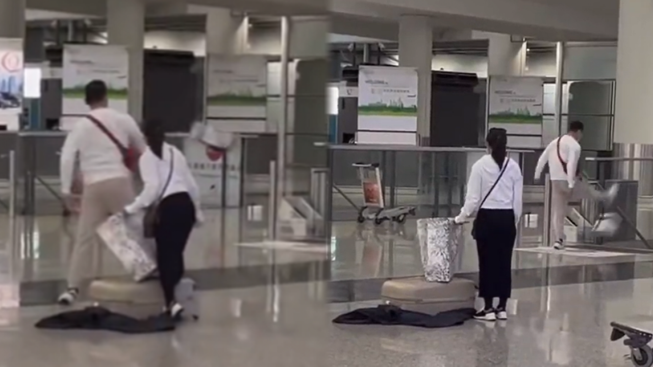 情侶大鬧香港國際機場片段熱傳 港男怒掟女友行李落樓梯 一走了之