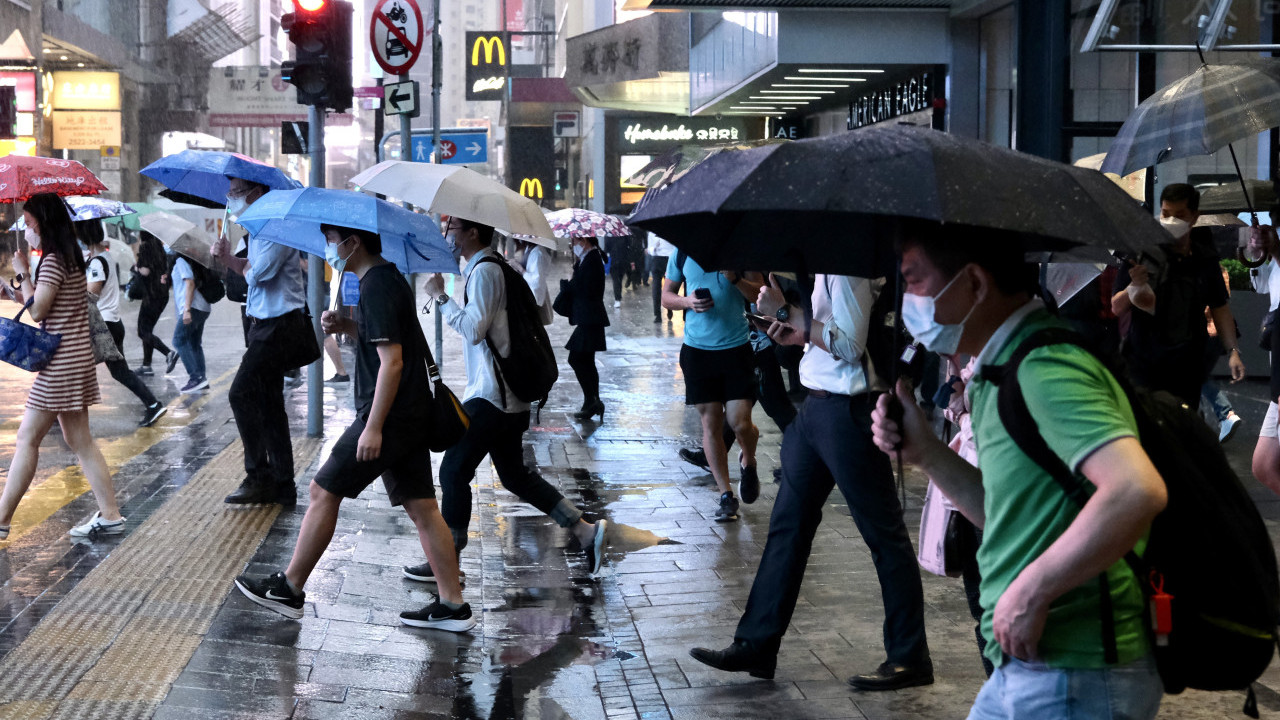 Typhoon Capricorn Unleashes Chaos: HK Observatory Raises Alert as Commuters Scramble to Work Amid Collisions and Complaints