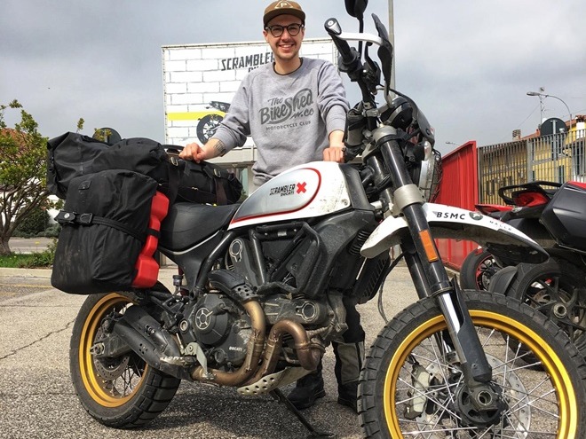 英國青年電單車遊世界籌款 Ducati 送車助善舉