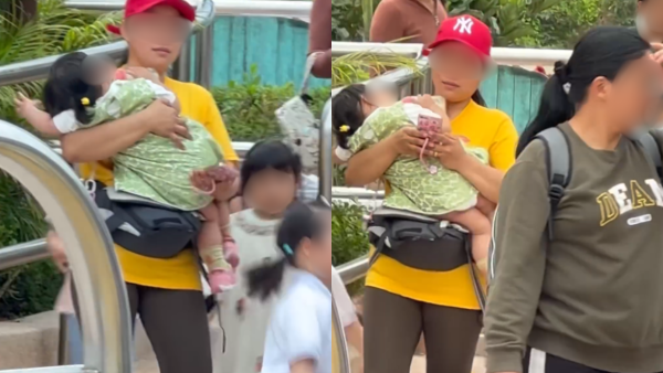 海洋公園女童「倒豎葱」跌落滑梯底！外傭竟笑笑口滿不在乎？邊玩手機邊抱女童離開遭網民圍轟！